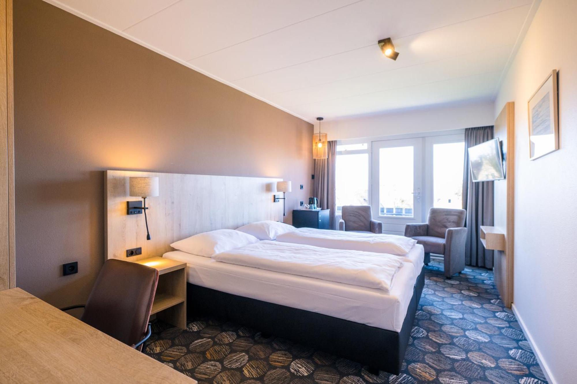 Hotel Hofker Нес Экстерьер фото